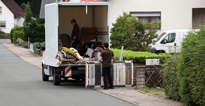 Removal men loading a truck